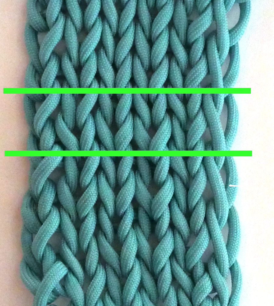 green lines show two rows of knitting with the slip stitch on right edge being pulled up two rows